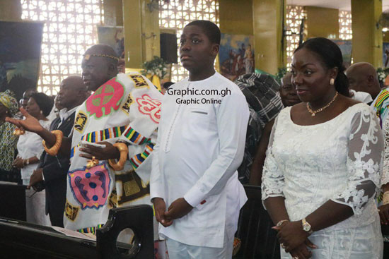 The Asantehene, Otumfuo Osei Tutu II (in Kente), opens his arms as he received blessings during his 69th Birthday Mass at the St Cyprian Anglican Cathedral in Kumasi. With him is wife, Lady Julia Osei Tutu, and son, Nana Kwame Kyeretwie. Pictures: EMMANUEL BAAH The Asantehene, Otumfuo Osei Tutu II (in Kente), opens his arms as he received blessings during his 69th Birthday Mass at the St Cyprian Anglican Cathedral in Kumasi. With him is wife, Lady Julia Osei Tutu, and son, Nana Kwame Kyeretwie. Pictures: EMMANUEL BAAH