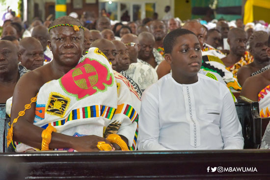 Nana Kwame Kyeretwie sits next to his father during the mass at the St Cyprian Anglican Church at Fante New Town in Kumasi. Nana Kwame Kyeretwie sits next to his father during the mass at the St Cyprian Anglican Church at Fante New Town in Kumasi.