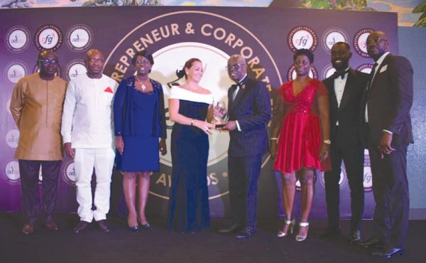 Mr Kwamena Bartels receiving his award from the French Ambassador in Ghana, Mrs Anne Sophie Ave Mr Kwamena Bartels receiving his award from the French Ambassador in Ghana, Mrs Anne Sophie Ave