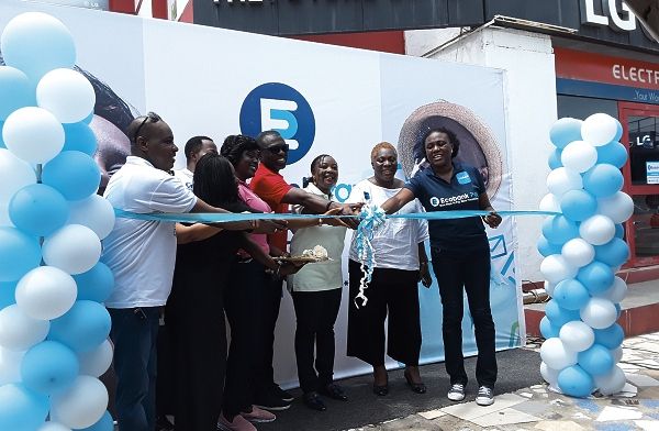 Mrs Josephine Anan-Ankomah (3rd right) together with other dignitaries cutting the tape for the launch of the EcobankPay Zone