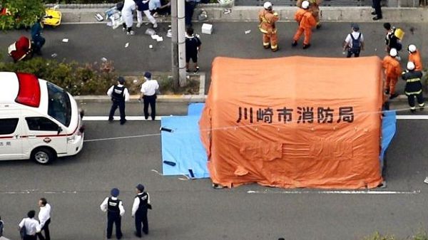 Paramedics set up tents at the scene to treat the injured Paramedics set up tents at the scene to treat the injured