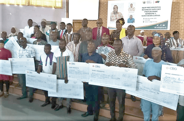 Dr Ibrahim Mohammed Awal with some of the beneficiaries Dr Ibrahim Mohammed Awal with some of the beneficiaries