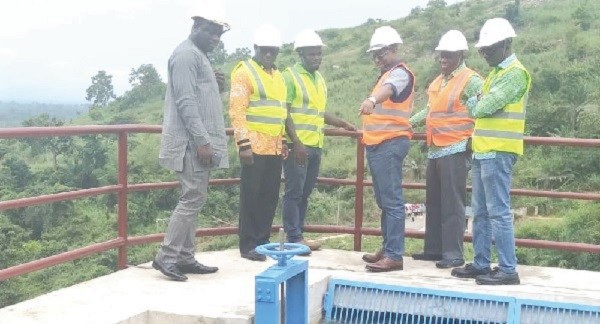 Mr John-Peter Amewu (3rd right) being conducted round the facility Mr John-Peter Amewu (3rd right) being conducted round the facility