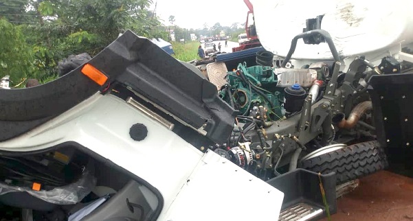 The badly damaged van at the accident scene The badly damaged van at the accident scene