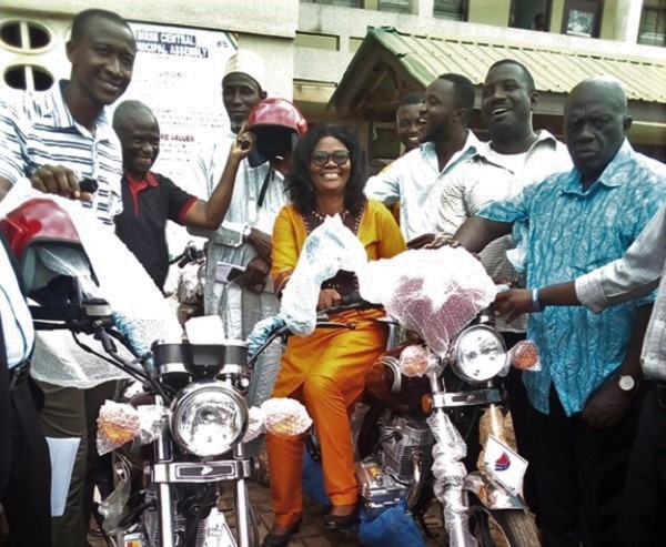 Ms Victoria Adu sitting on one of the motorbikes Ms Victoria Adu sitting on one of the motorbikes