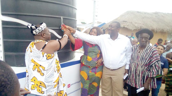 Mr. Ken Arthur, (2nd right) being assisted by Ms Madam Sarah Dugbakie Pobee and Nene Lomo IV, (left) Divisional Chief of the Lomobiawe Clan of Ada to inaugurate the facility. Mr. Ken Arthur, (2nd right) being assisted by Ms Madam Sarah Dugbakie Pobee and Nene Lomo IV, (left) Divisional Chief of the Lomobiawe Clan of Ada to inaugurate the facility.