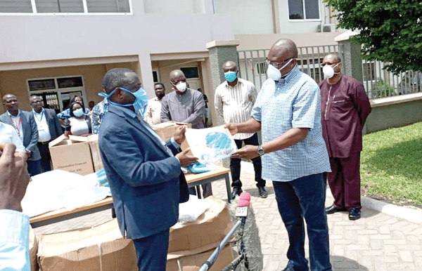 Mr Prosper Bani (right) handing over the equipment to Dr Daniel Asare Mr Prosper Bani (right) handing over the equipment to Dr Daniel Asare