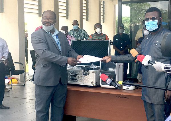 Prof. Abraham Kwabena Annan (left) receiving the testing equipment from Mr Gregory Rockson (right) Prof. Abraham Kwabena Annan (left) receiving the testing equipment from Mr Gregory Rockson (right)