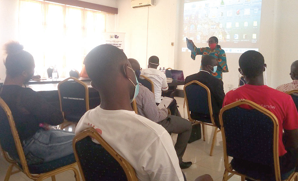 Mrs Thywill Eyra Kpe making a presentation at the workshop Mrs Thywill Eyra Kpe making a presentation at the workshop