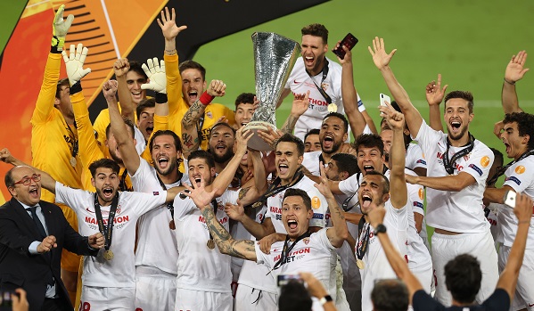 Players of Sevilla celebrating their Europa League triumph over Inter Milan Comeback kings: Sevilla fight back to deny Inter Europa League glory
