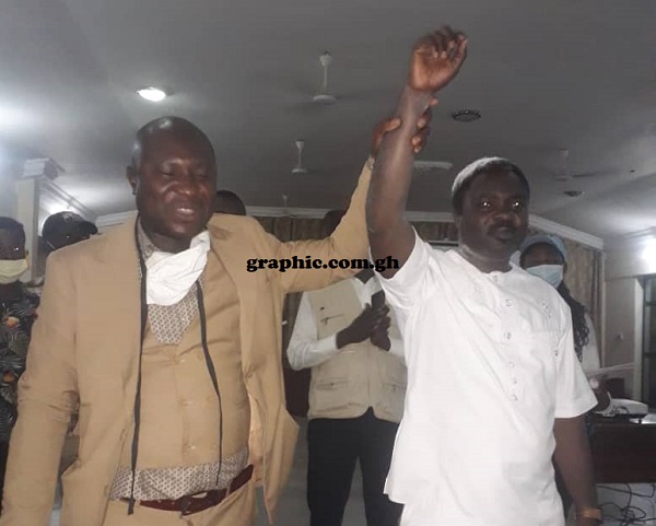 Mr Godwin Amankwa (left), the Returning Officer for Suhum, declaring Mr Kwadjo Asante, the MP elect for the Suhum constituency, Mr Godwin Amankwa (left), the Returning Officer for Suhum, declaring Mr Kwadjo Asante, the MP elect for the Suhum constituency,