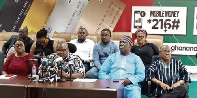 Mr Kakra Essamuah (2nd left) addressing the media. With him are some executive of the NDC