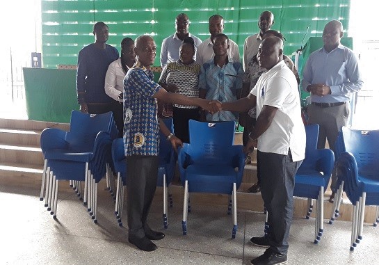 Mr Nathan Otoo (right) making the presentation to Mr Charles K. Baidoo. Mr Nathan Otoo (right) making the presentation to Mr Charles K. Baidoo.