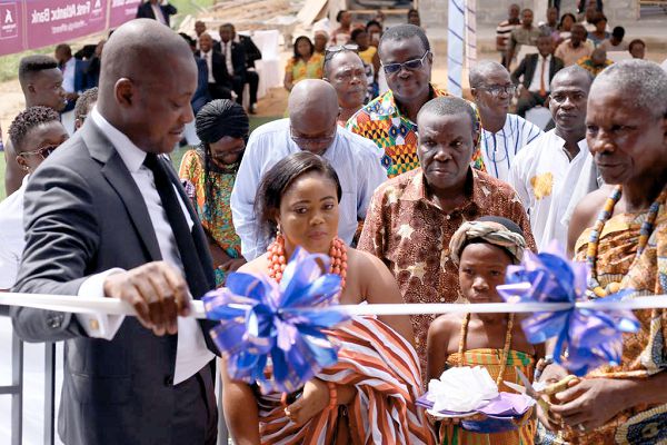 Mr Odun Odunfa, CEO of First Atlantic Bank (left) supporting Nana Kwadjo Addai II (right), to cut the sod to commission the block Mr Odun Odunfa, CEO of First Atlantic Bank (left) supporting Nana Kwadjo Addai II (right), to cut the sod to commission the block