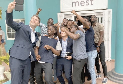  Mr Casper Klynge (left) with some young tech entrepreneurs at the Meltwater Entrepreneurial School of Technology (mest)