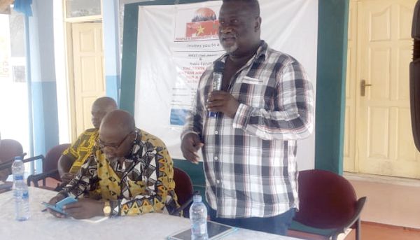 Dr Kojo Opoku Aidoo (standing) delivering a speech at the forum Dr Kojo Opoku Aidoo (standing) delivering a speech at the forum