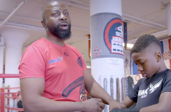 Joseph Awinongya Jnr (left) getting his son ready for a bout Joseph Awinongya Jnr (left) getting his son ready for a bout