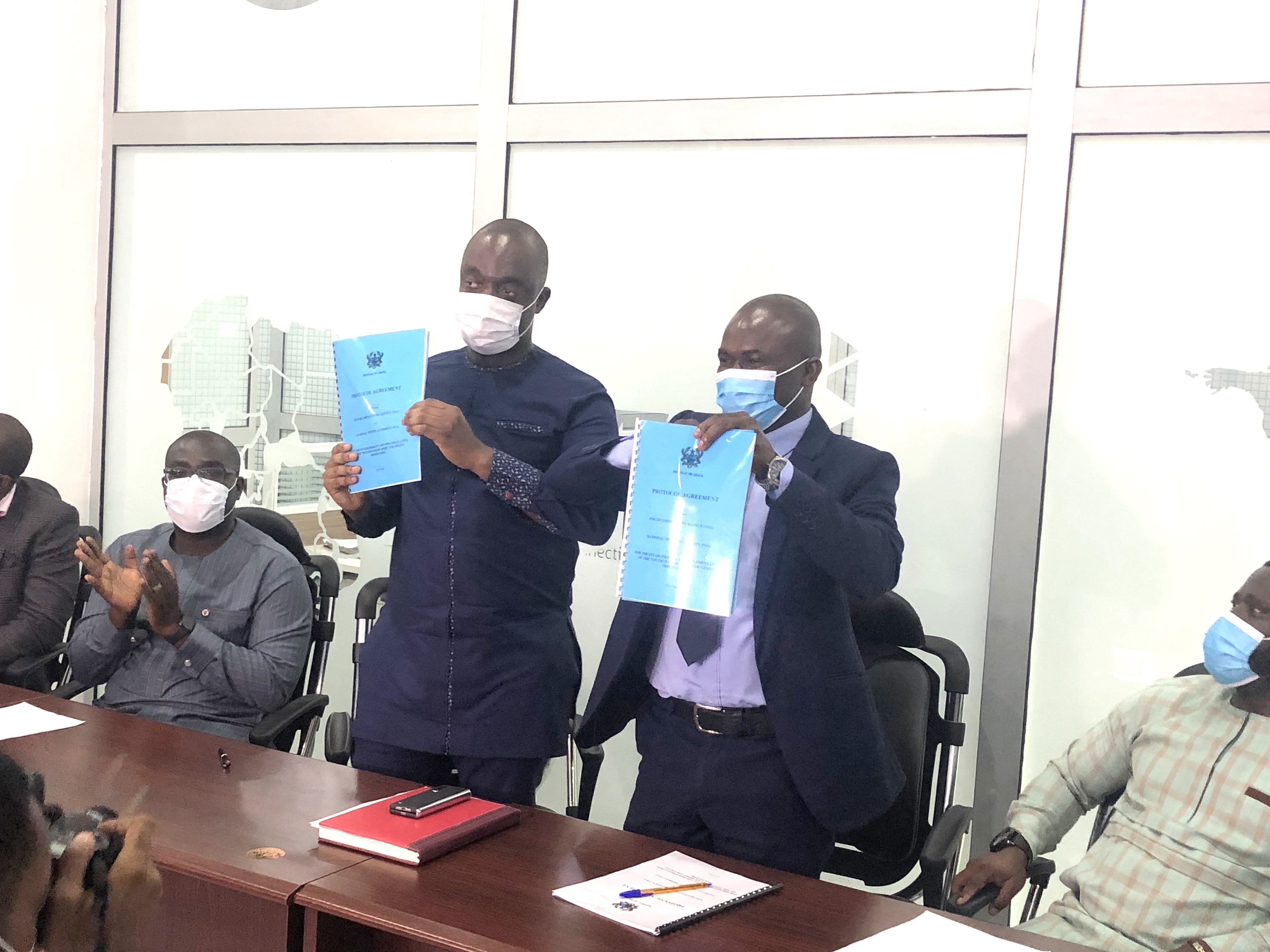 Mr Justin Kodua (left) with Prof. Peter Twumasi displaying the MOU after the signing Sports: YEA to support 1000 athletes with monthly allowance