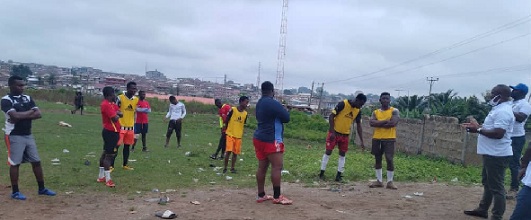 Mr Akwasi Kwarteng (back to camera) interacting with the youth during the sub-committee’s visit to one of the communities. Mr Akwasi Kwarteng (back to camera) interacting with the youth during the sub-committee’s visit to one of the communities.