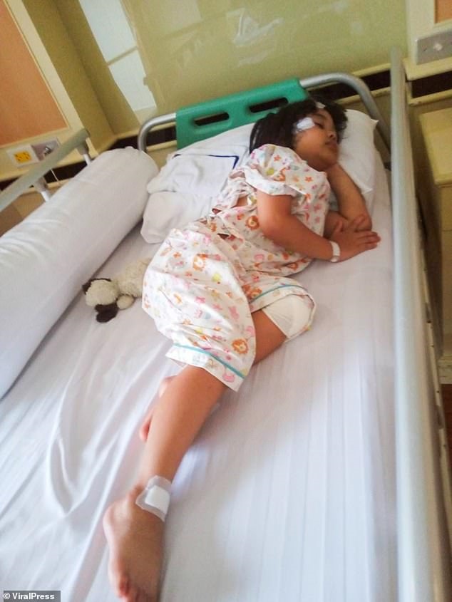 The four-year-old spent the night in hospital with cuts to her legs, hands and head. Girl, 4, runs into a glass door as she plays chase with her friend