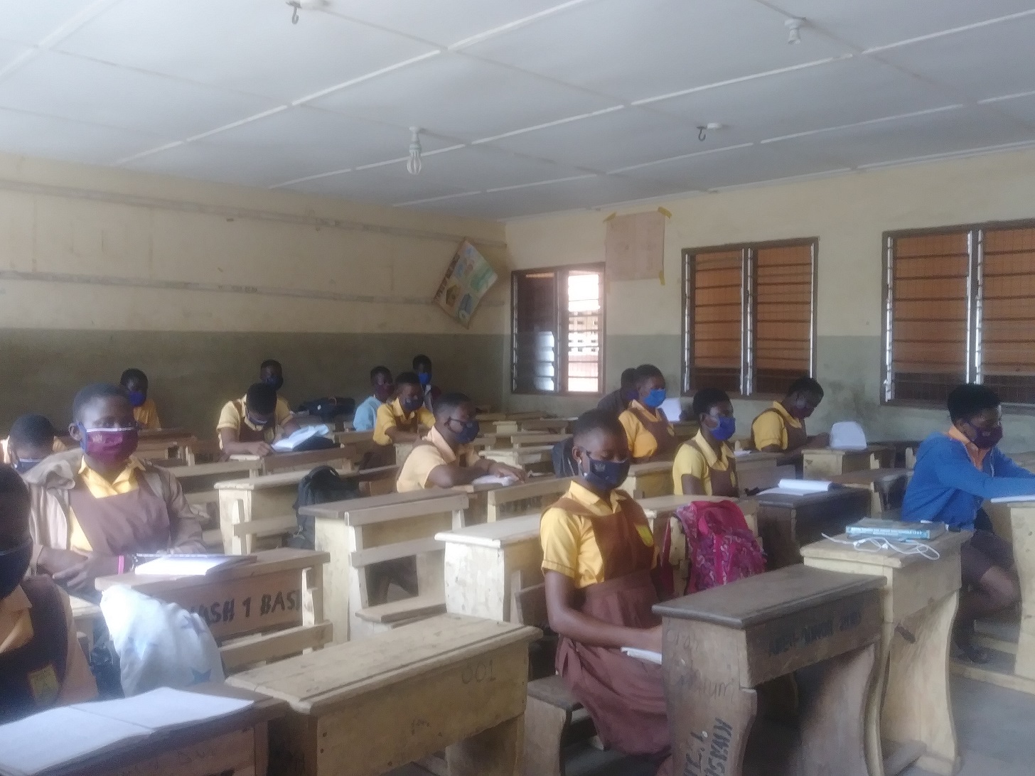 Final-year students of Kwashieman One Basic School, wearing their face masks provided by the government. Schools prepare for BECE