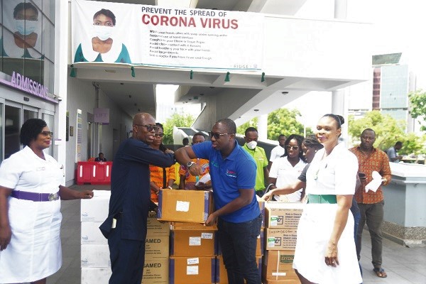 Mr Solomon Ohene Owusu (right) presenting the medical supplies to Dr Emmanuel Srofenyoh in Accra. Picture: Emmanuel Quaye Mr Solomon Ohene Owusu (right) presenting the medical supplies to Dr Emmanuel Srofenyoh in Accra. Picture: Emmanuel Quaye