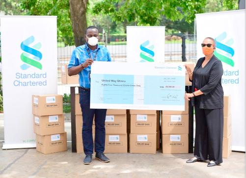  Mr Kweku Nimfah-Essuman making the presentation to Ms Janet Butler