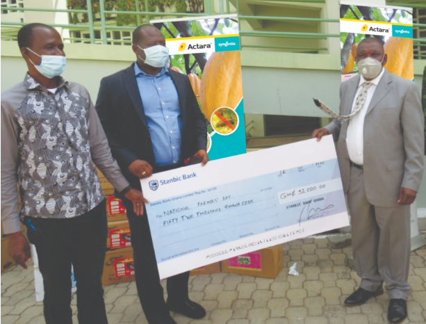 Presenting the cheque are Mr. Imoro Sulemana, Acting CEO of African Tiger Holding/Overseas Warehouse Ltd. and Mr. Busia Dawuni, Managing Director of IWAD Ghana Ltd. while Dr. Nurah Gyele, Minister of State at the Ministry of Food and Agriculture receives it on behalf of the Ministry. Presenting the cheque are Mr. Imoro Sulemana, Acting CEO of African Tiger Holding/Overseas Warehouse Ltd. and Mr. Busia Dawuni, Managing Director of IWAD Ghana Ltd. while Dr. Nurah Gyele, Minister of State at the Ministry of Food and Agriculture receives it on behalf of the Ministry.