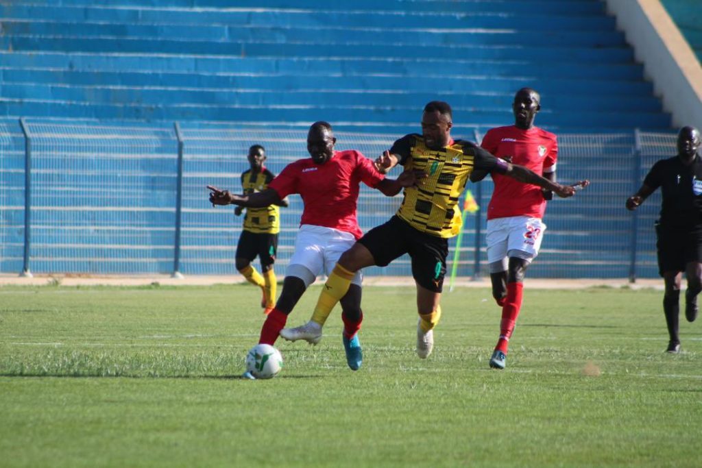 Jordan Ayew holds on to the ball as Sudanese markers close in VIDEO: Sudan beat Black Stars 1-0