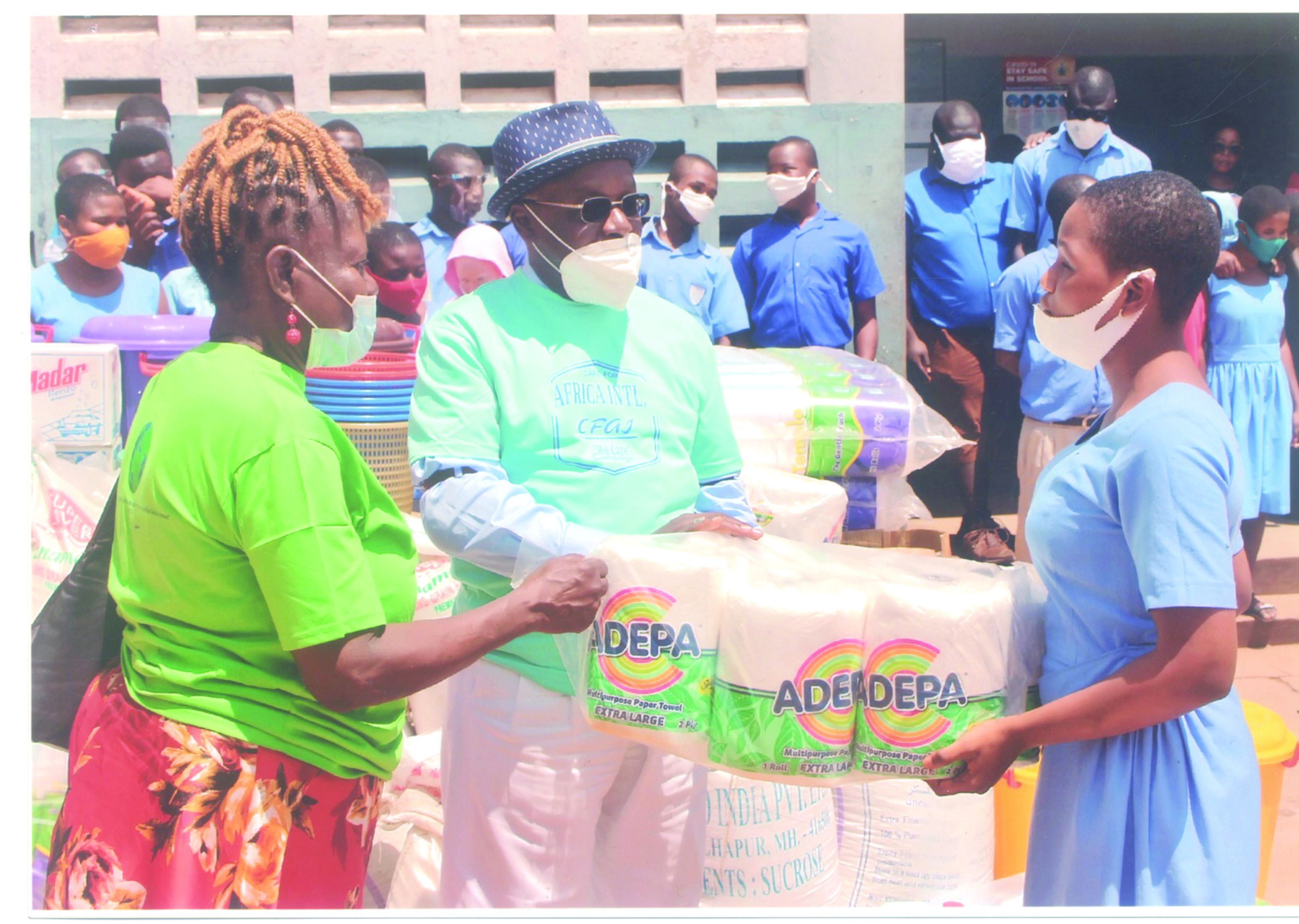 Directors of Care For Africa International presenting the items to Akropong School for the Blind Directors of Care For Africa International presenting the items to Akropong School for the Blind