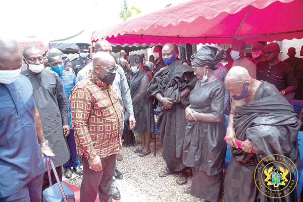 President Akufo-Addo consoling the mother of the late MP