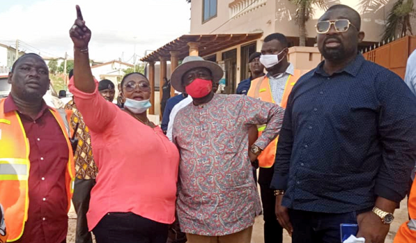 Ms Gifty Tina Mensah (hand raised) making a point to Nana Agyemang-Prempeh (in hat), while other officials look on Ms Gifty Tina Mensah (hand raised) making a point to Nana Agyemang-Prempeh (in hat), while other officials look on