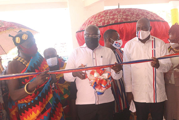 Dr Bawumia (middle) cutting the tape to inaugurate the new boys’ dormitory for the Nkenkansu SHS in the Offinso North District in the Ashanti Region. With him are Mr Collins Ntim (right), the MP for Offinso North, and Dr Nana Kwaku Duah (in Kente), the Offinso Nifahene. Pictures: EMMANUEL BAAH Dr Bawumia (middle) cutting the tape to inaugurate the new boys’ dormitory for the Nkenkansu SHS in the Offinso North District in the Ashanti Region. With him are Mr Collins Ntim (right), the MP for Offinso North, and Dr Nana Kwaku Duah (in Kente), the Offinso Nifahene. Pictures: EMMANUEL BAAH