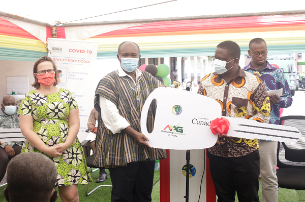 Mr Derek Owusu-Ansah (right), Project Manager of TEDMAG, presenting a symbolic key to the buses (inset) to Mr Patrick Robert Ankobeah, with Ms Stephanie Brunet (left) looking on. Picture: NII MARTEY M. BOTCHWAY Mr Derek Owusu-Ansah (right), Project Manager of TEDMAG, presenting a symbolic key to the buses (inset) to Mr Patrick Robert Ankobeah, with Ms Stephanie Brunet (left) looking on. Picture: NII MARTEY M. BOTCHWAY