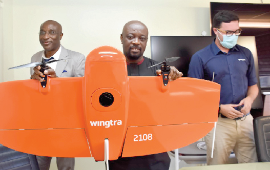 Mr. Kwame Agyeman-Budu examining one of the drones after receiving them from officials of Sahara Natural Resources Mr. Kwame Agyeman-Budu examining one of the drones after receiving them from officials of Sahara Natural Resources