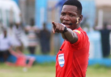 Referee Daniel Laryea Referee Daniel Laryea