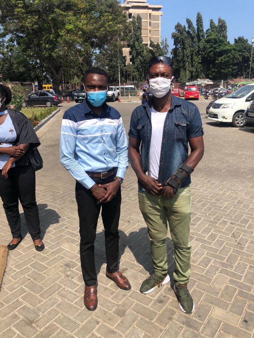 Agyemang Duah (right) with a representative of Lakeside estate Former Black Stars player Agyemang Duah gets support from Lakeside Estate