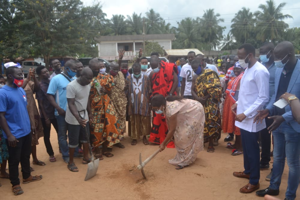 Mrs Cynthia Morrison cutting the sod for commencement of the project at Otabilkrom. In attendance are Mr Jerry Ahmed Sahib. (2nd right) and other guests. Minister cuts sod for GH₵3m astro turf projects in Agona West