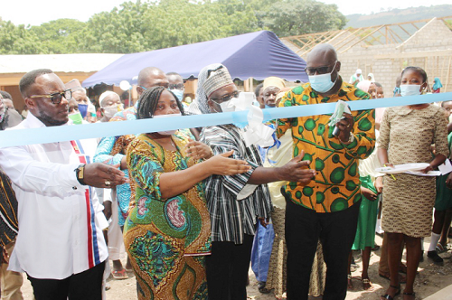 Mr Daniel Akuffo, DCE for Shai Osudoku, (2nd right), Mr Obiri-Yeboah, representative of Educational Charity Foundation for Ghana (middle), ms Mercy Keteku (2nd left), representative of the District Education Officer, Mr Benjamin Nargah, NPP Parliamentary candidate (left) cutting a ribbon Mr Daniel Akuffo, DCE for Shai Osudoku, (2nd right), Mr Obiri-Yeboah, representative of Educational Charity Foundation for Ghana (middle), ms Mercy Keteku (2nd left), representative of the District Education Officer, Mr Benjamin Nargah, NPP Parliamentary candidate (left) cutting a ribbon