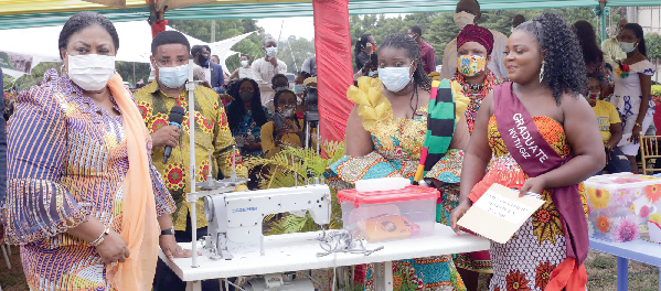 Mrs Rebecca Akufo Addo (left) presenting some start up kits to one of the beneficiaries. Picture: NII MARTEY M. BOTCHWAY Mrs Rebecca Akufo Addo (left) presenting some start up kits to one of the beneficiaries. Picture: NII MARTEY M. BOTCHWAY