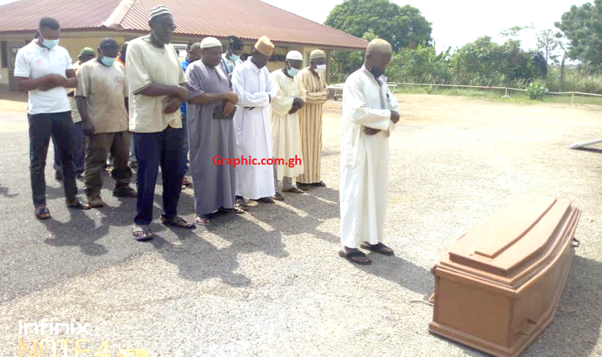 Muslim prayers being offered for the deceased before his re-burial Muslim prayers being offered for the deceased before his re-burial