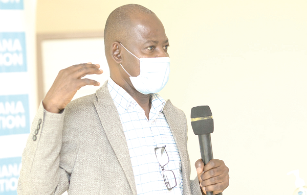 Dr Steve Manteaw (left), Chairman, Civil Society Platform on Oil and Gas, making a presentation Dr Steve Manteaw (left), Chairman, Civil Society Platform on Oil and Gas, making a presentation