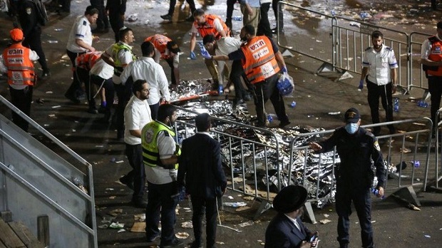 Thousands of people had struggled to flee the chaos through a narrow passageway Thousands of people had struggled to flee the chaos through a narrow passageway