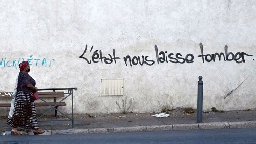 'The state is letting us down' is the message on this wall on the housing estate where a boy was killed Marseille drugs: Child victims of French city's vicious gang war