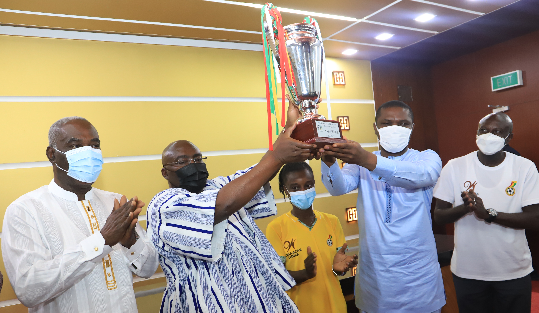 • Vice-President Dr. Mahamudu Bawumia (2nd left) together with Mr. Mustapha Ussif (2nd right), Minister of Youth and Sports, lifting the trophy. With them are Miss Janet Egyir (3rd left) and some officials. Picture: SAMUEL TEI ADANO • Vice-President Dr. Mahamudu Bawumia (2nd left) together with Mr. Mustapha Ussif (2nd right), Minister of Youth and Sports, lifting the trophy. With them are Miss Janet Egyir (3rd left) and some officials. Picture: SAMUEL TEI ADANO