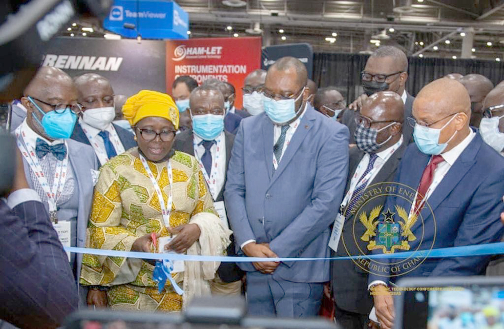Dr Mathew Opoku-Prempeh (3rd right), Minister of Energy, assisting Hajia Alima Mahama (2nd left), Ghana Ambassador to USA, and Mr Yofi Grant (left), CEO of GIPC, to cut the ribbon to officially open the Ghana Pavilion at the 2021 OTC. Picture by Charles Benoni Okine