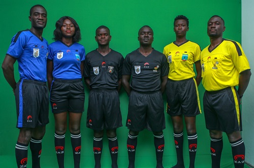 some referees outdooring the new kits