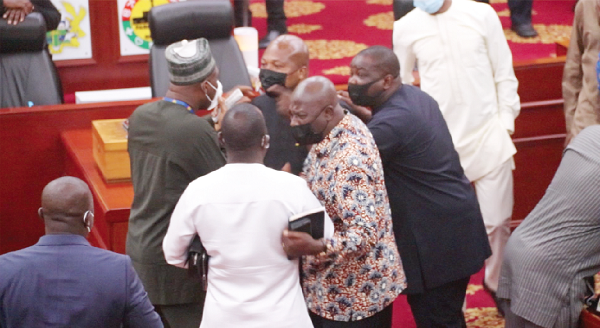 Some Members of Parliament in a heated debate during sitting yesterday Some Members of Parliament in a heated debate during sitting yesterday