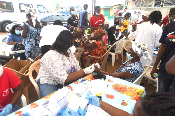A section of the medical team taking some of the residents of Chorkor in Accra through the medical check up A section of the medical team taking some of the residents of Chorkor in Accra through the medical check up