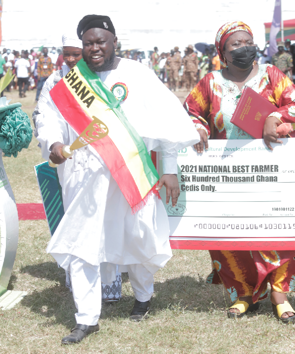 Alhaji Mashud Mohammed, the overall best farmer, after picking his award Alhaji Mashud Mohammed, the overall best farmer, after picking his award